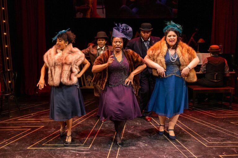 The cast of Ain't Misbehavin' dancing.